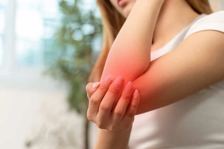 Localized joint discomfort around the elbow area
